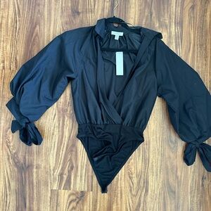 Black Topshop blouse for sale. Never worn.